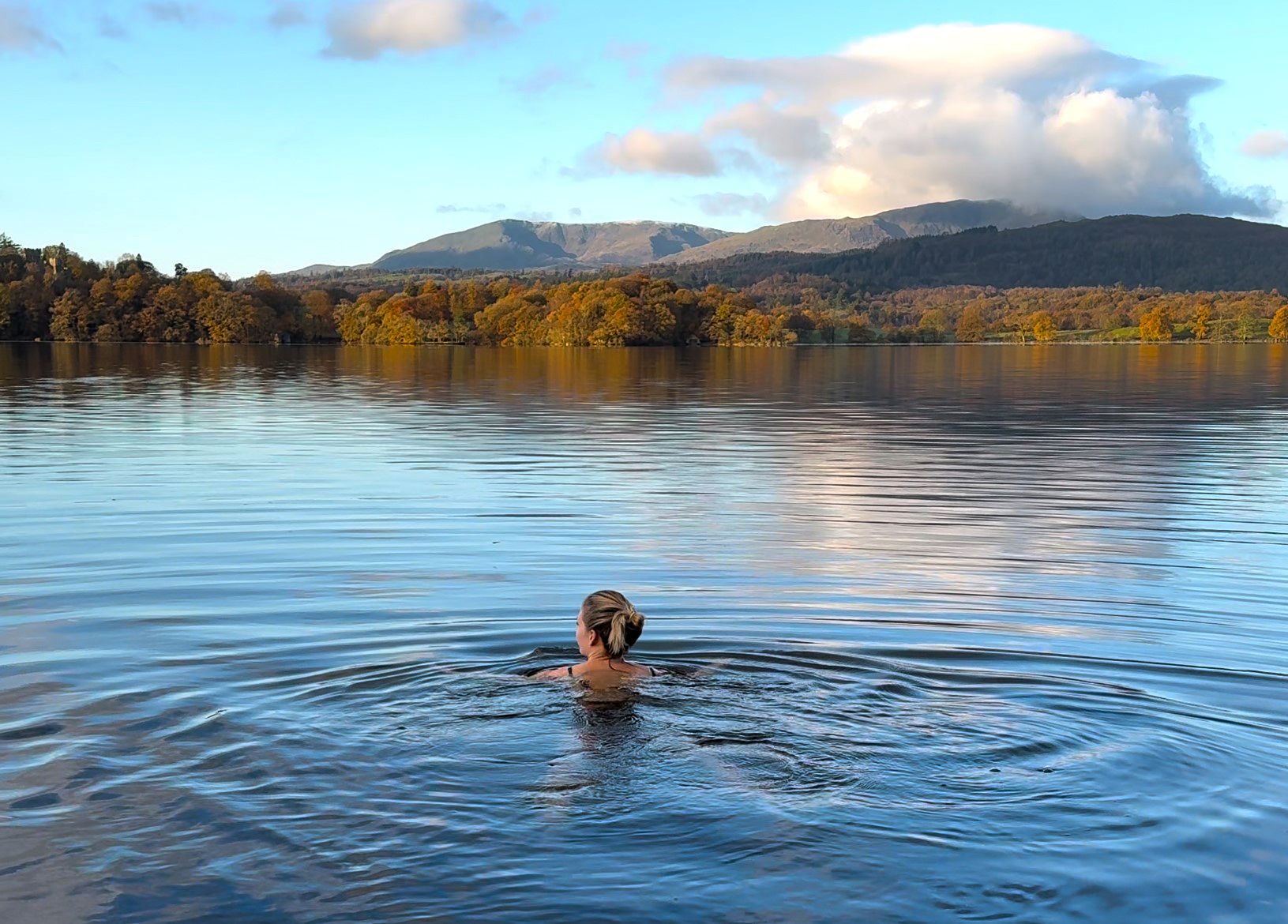 A woman swimming in a lake