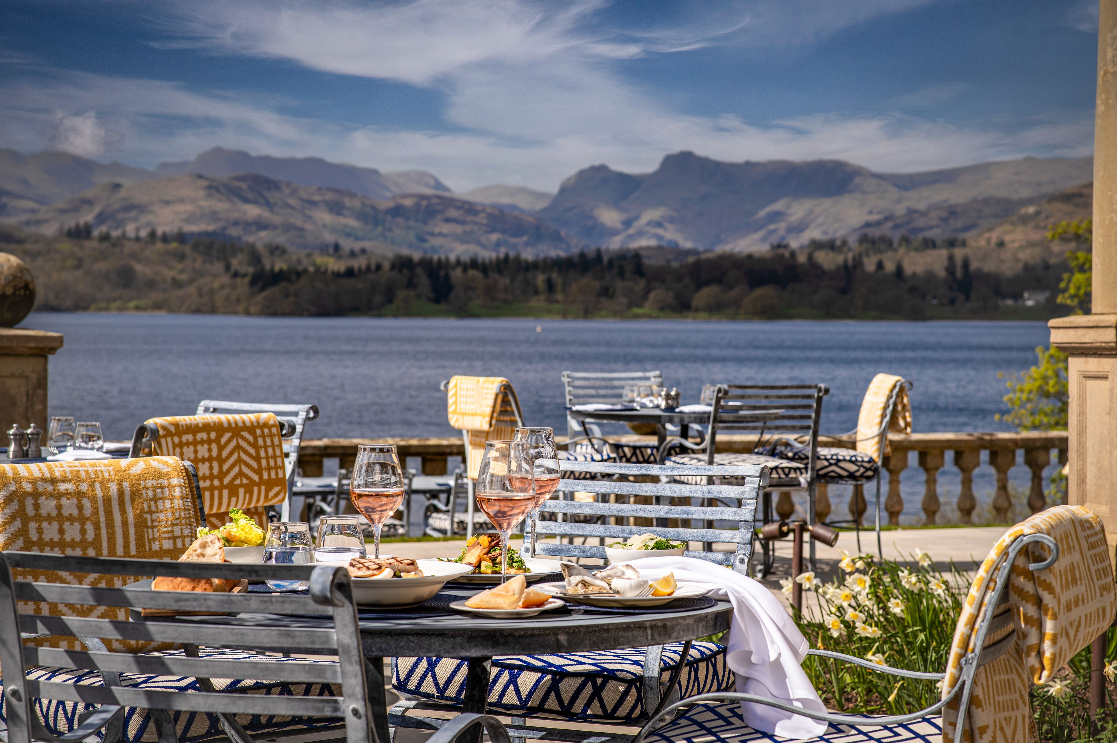 Dining area outside with a view of the lake