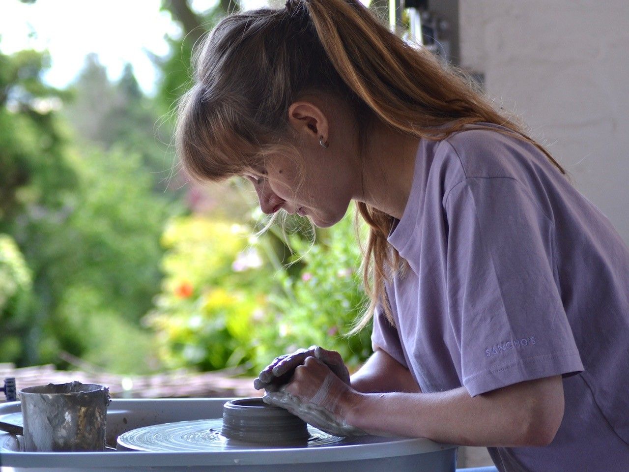 Lauren Frost doing pottery