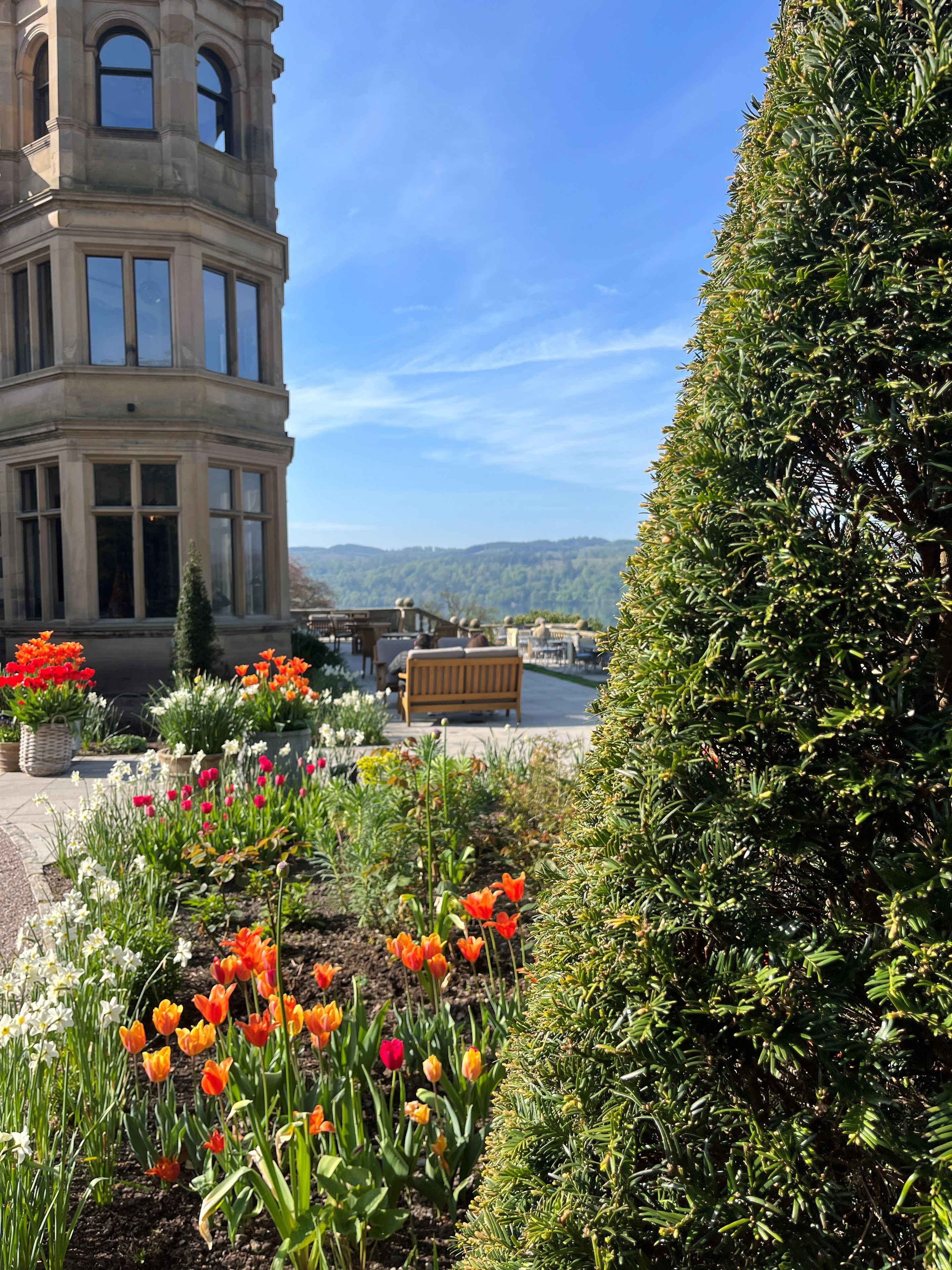 Floral arrangement with view of Lake Windermere